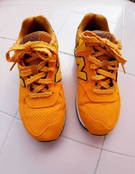 Ténis NB amarelo