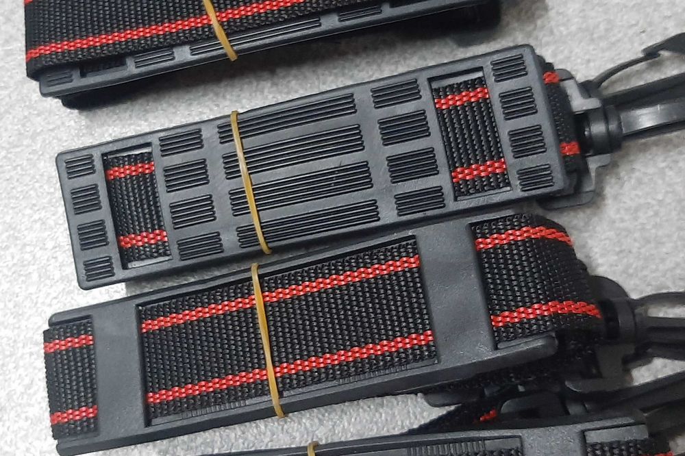 Alça de suporte de mala