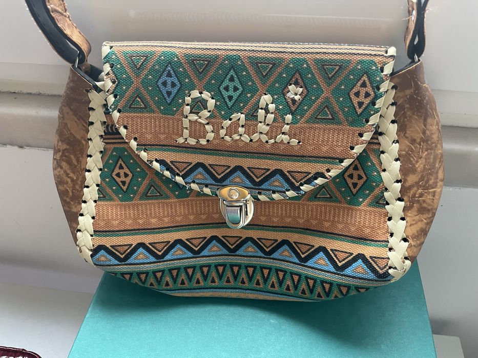 Vendo mala a tiracolo