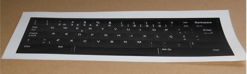 Self-adhesive keys convert foreign keyboards into NEW Portuguese64585104113537122