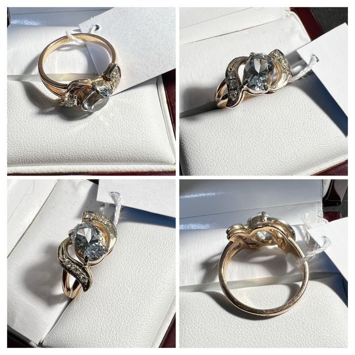 Золоте кільце з топазом та діамантами 585 проби