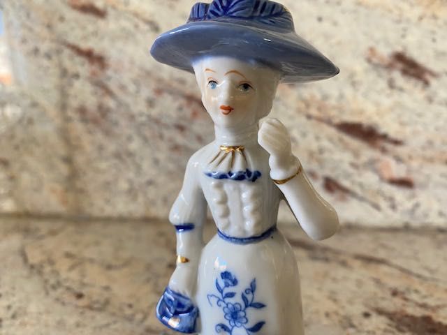 Estatueta em porcelana