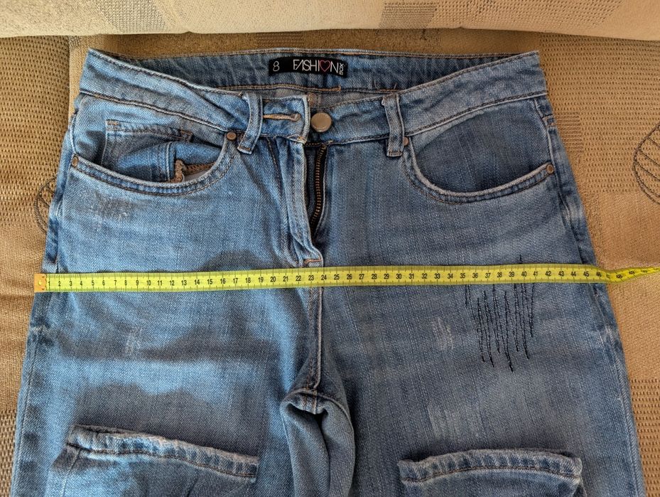 Damskie spodnie jeansowe roz. 36