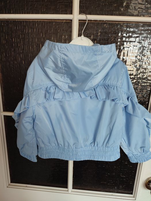 Блакитна куртка вітрівка на дівчинку 4/5 років