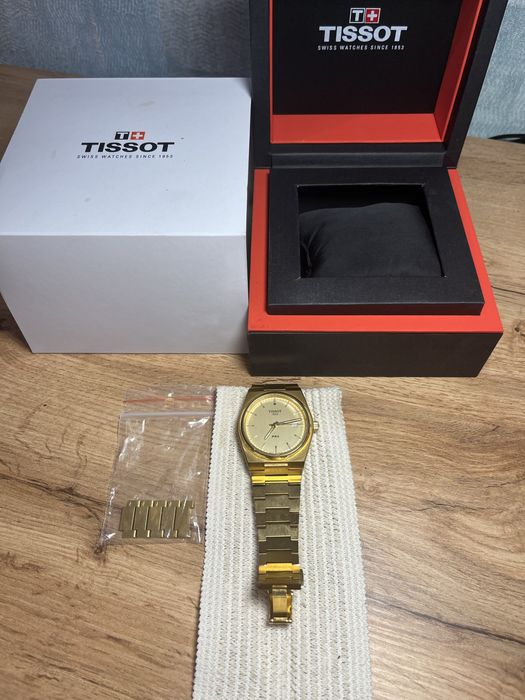Tissot  PRX. Gold