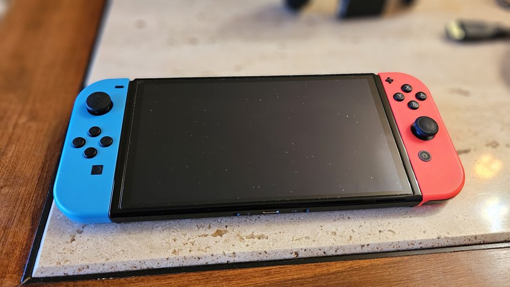 Nintendo Switch OLED 64GB (Neon Blue/Red) – Impecável