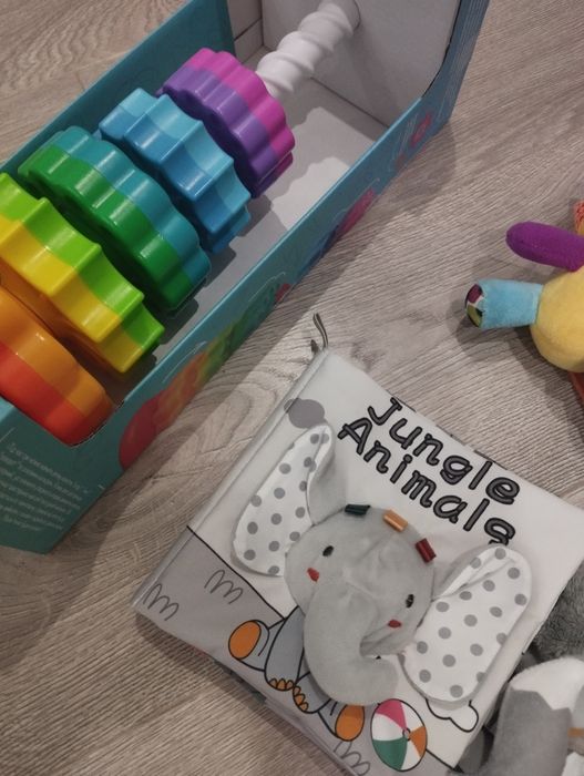 Іграшки брязкальце м'яка книжка чий хвіст