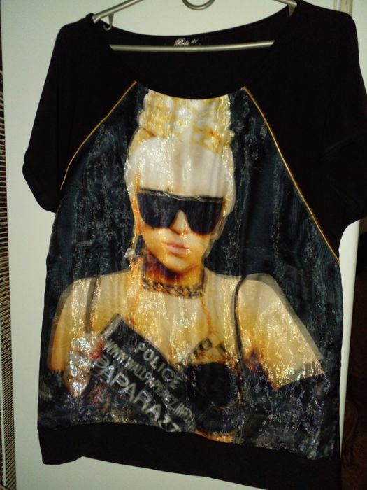 Продам женскую футболку