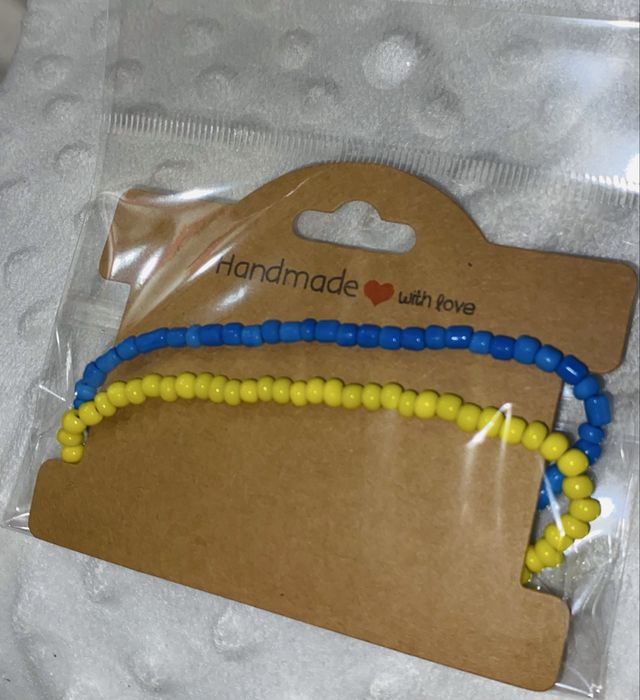 Brasoletka 20,5 cm z koralikow zolta z niebieska Ukraina