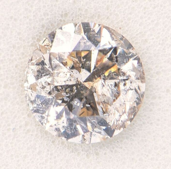 Naturalny Diament, brylant 0,54 ct, z certyfikatem autentyczności.