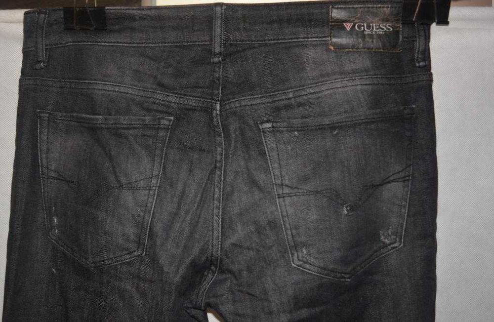 Jeansy z dziurami Guess 32 męskie