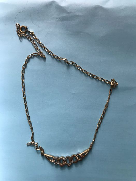 Fio de senhora dourado