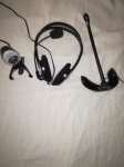 Camera, headphones with microphone and a microphone with stand.64552918132353120