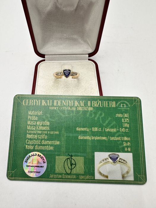 Złoty pierścionek z tanzanitem 0,45ct i diamentami