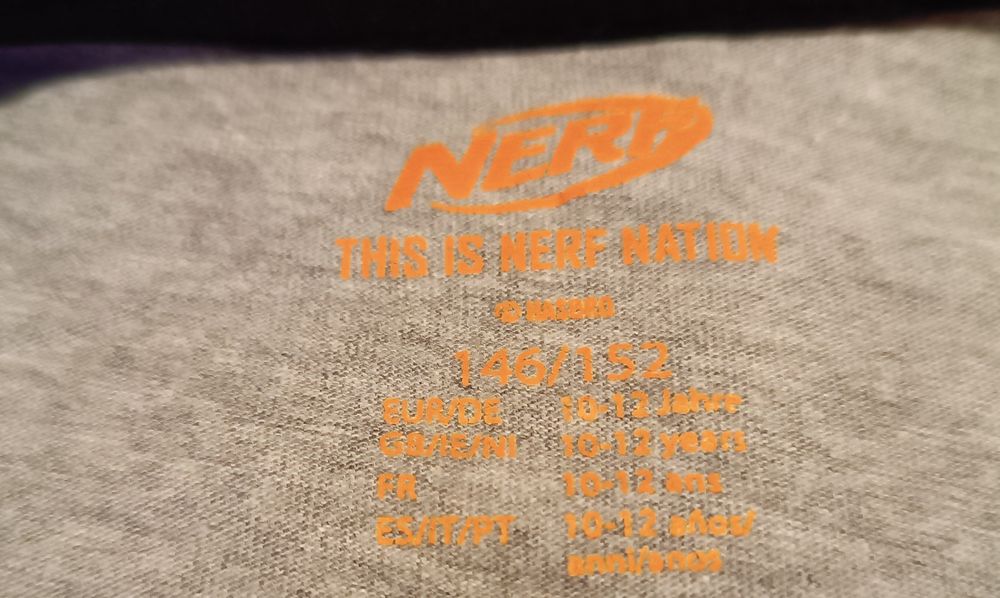 T-shirt cinzenta. Nerft. 10 Anos. Nova sem etiqueta