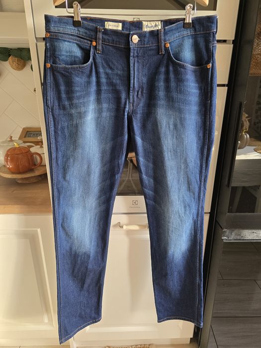 Jeansy męskie Wrangler Greensboro XL jak nowe prosta nogawka