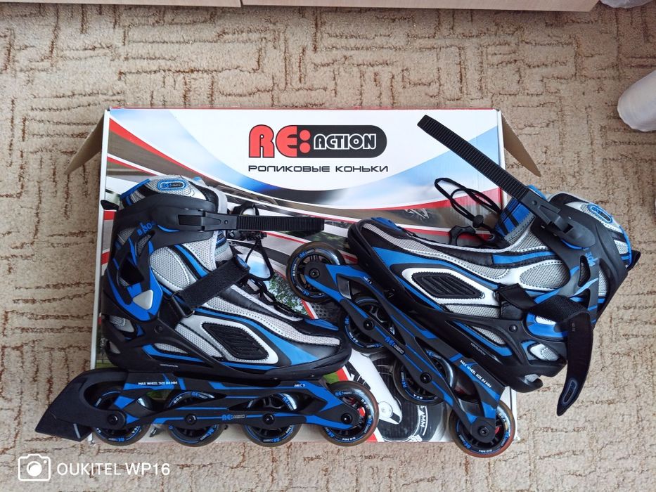 Роликовые коньки . Новые