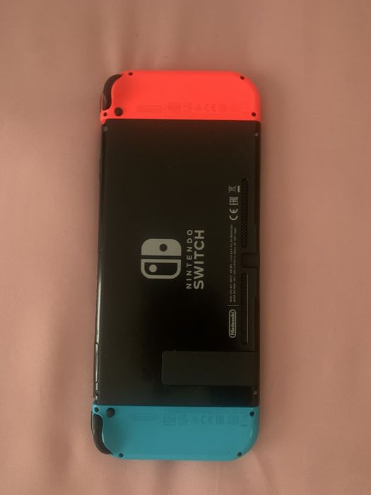 Nintendo Switch Vermelho/Azul Joy-Con c/Jogo Animal Crossing