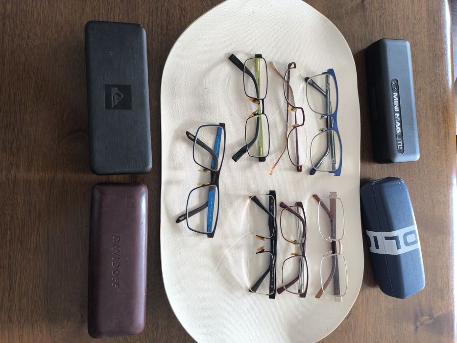 Óculos, armações e caixas