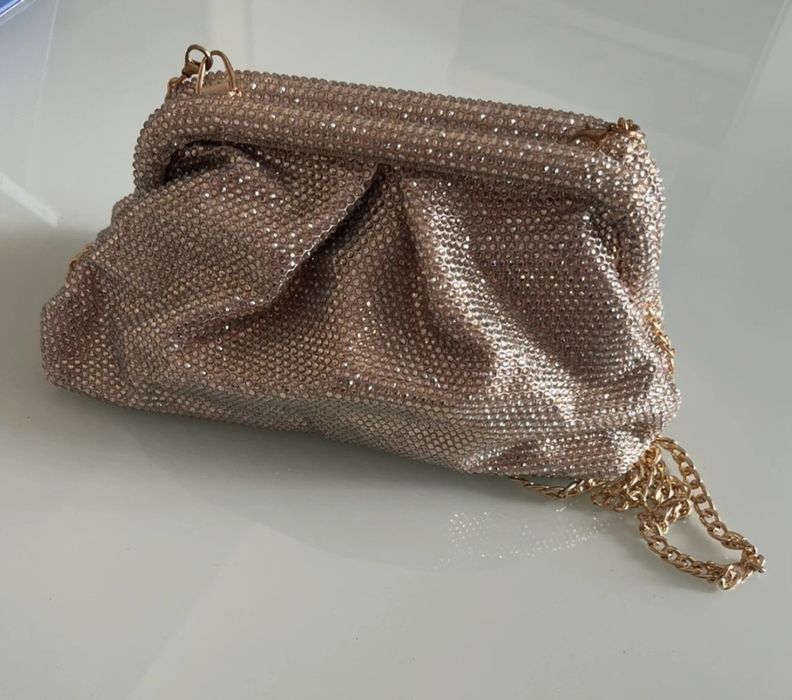 Clutch dourada com alça
