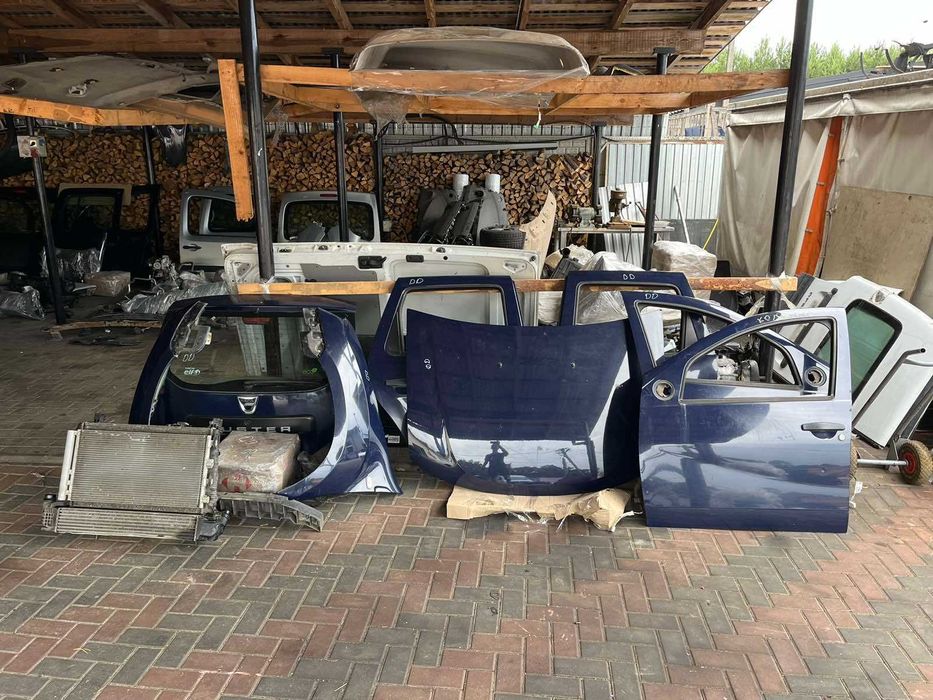 Двері праві ліві Renault Dacia Duster (2009-2018)