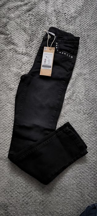 Nowe spodnie jeansowe coccodrillo r. 146