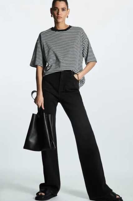 cos розкльошені джинси