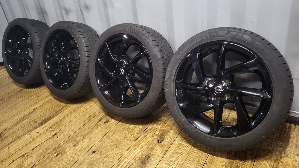 Felgi Opel 17" 4x100 z oponami 215/45 R17 Corsa E D Adam