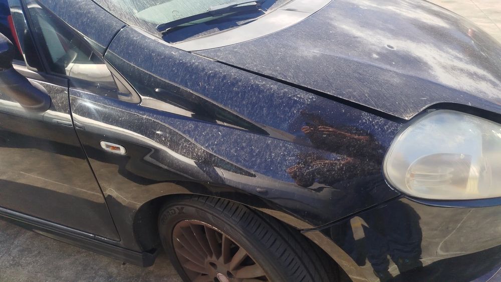 Guarda-lamas direito FIAT Grande Punto (199_)