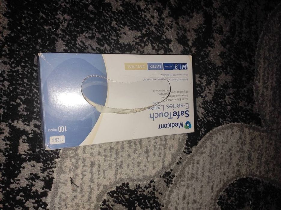 Перчатки смотровые нитриловые SafeTouch.