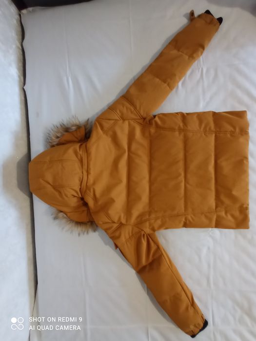 Продам пуховик Colins