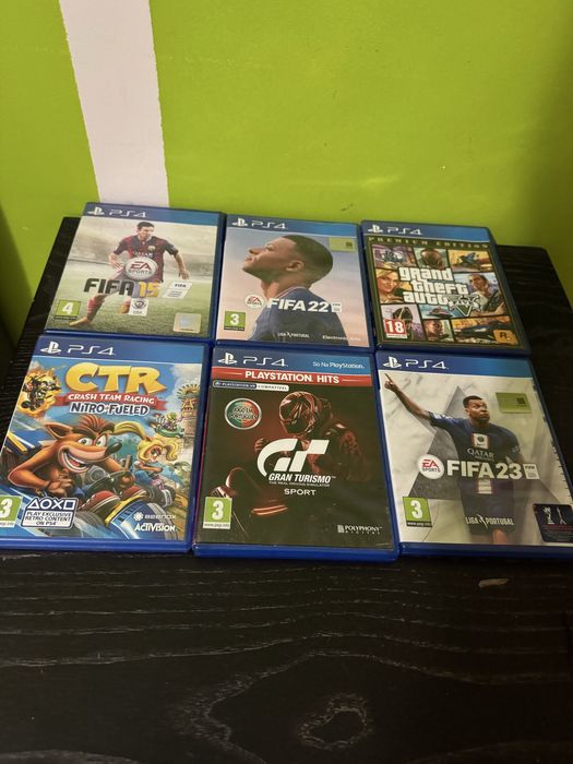 Ps4 branca (utilizada ) com 6 jogos um teclado e um comando