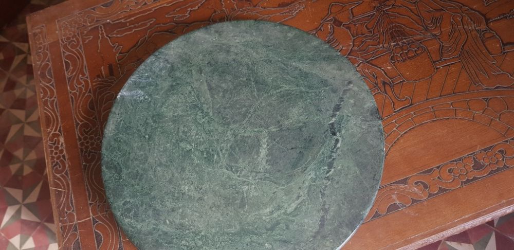 Centro de mesa giratorio em pedra