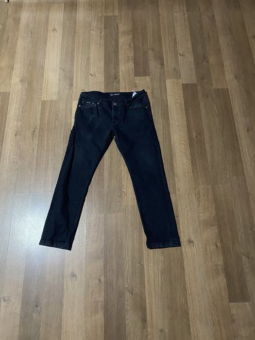 Джинси Versace