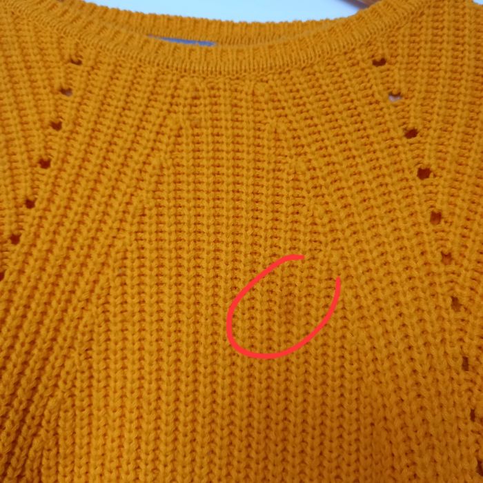 Pomarańczowy sweter