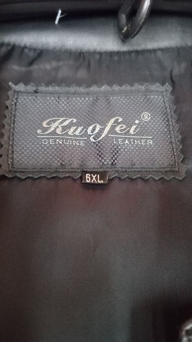 Черный кожаный плащ