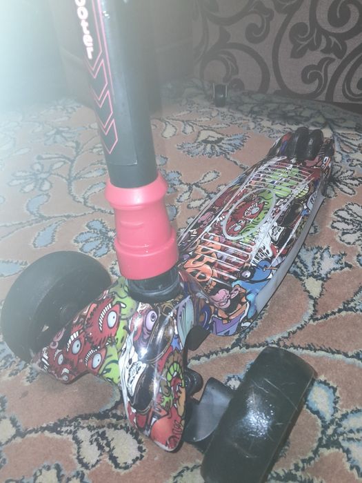 Трехколесный самокат