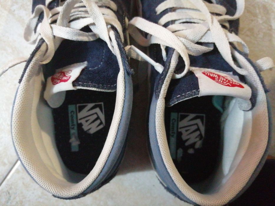 Vans bota azuis e pretos