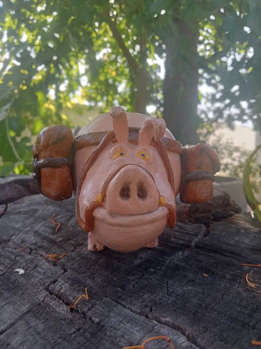 Escultura Porco Viajante