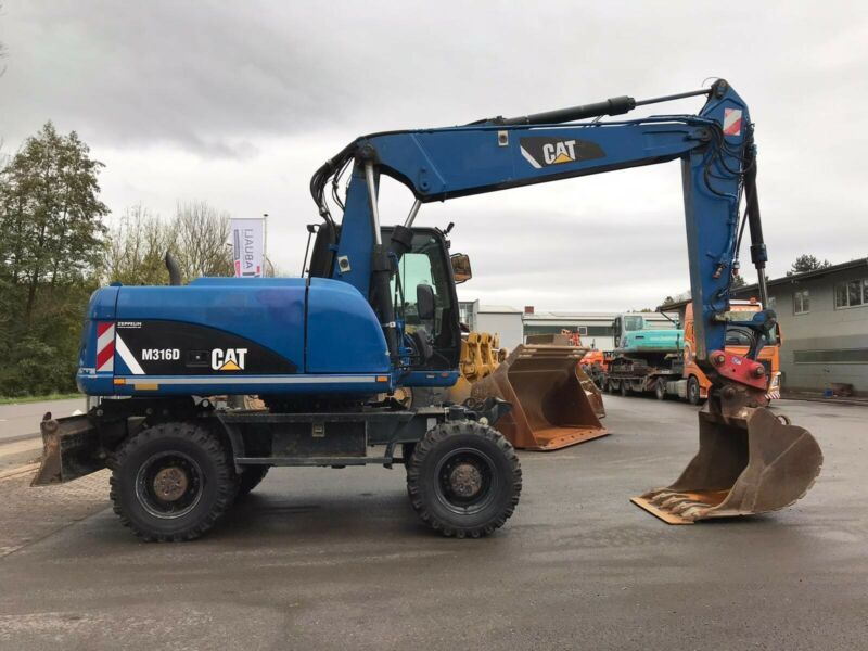 В аренд колёсный экскаватор 1куб.м. Услуги полноповоротн Атлас Atlas