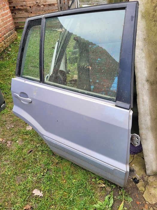 Двері задні на форд фюжин 2011рік