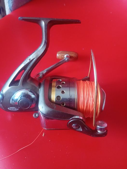 Катушка рыбальска ТН500 как новая