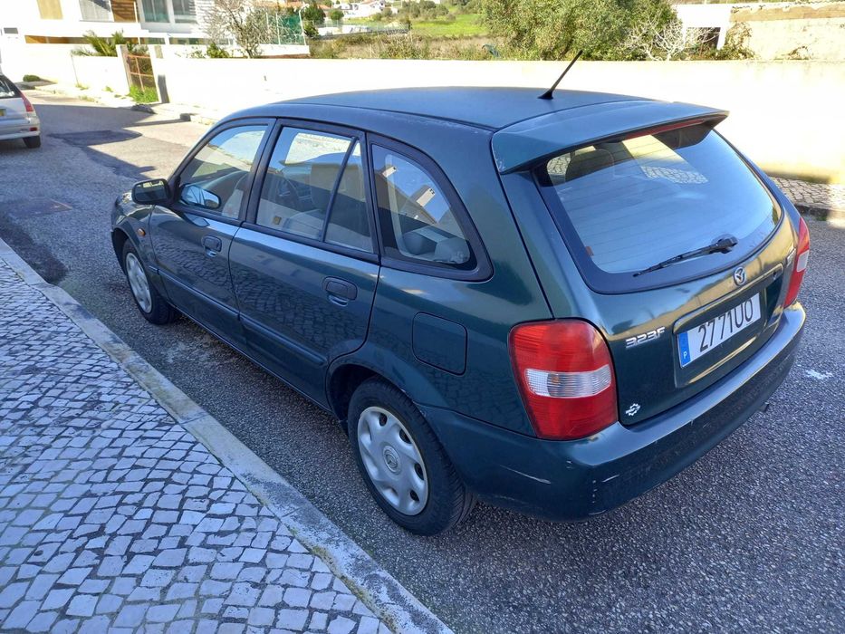 mazda 323 f bom e barato