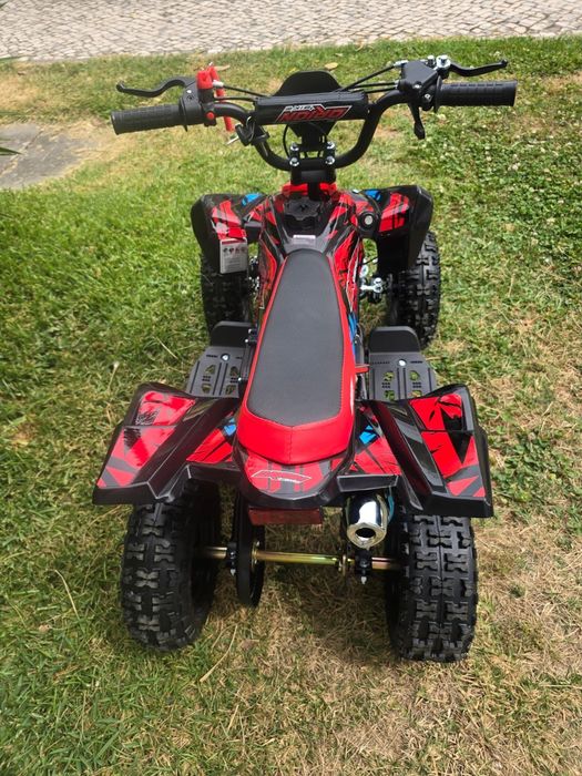 Mini mota 4 novo dentro da caixa gasolina 49cc