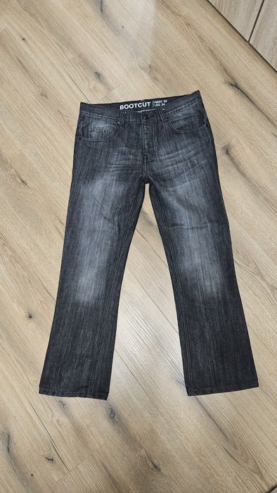Męskie czarne jeansy Bootcut Primark W32 L34 – przecierany efekt / guziki