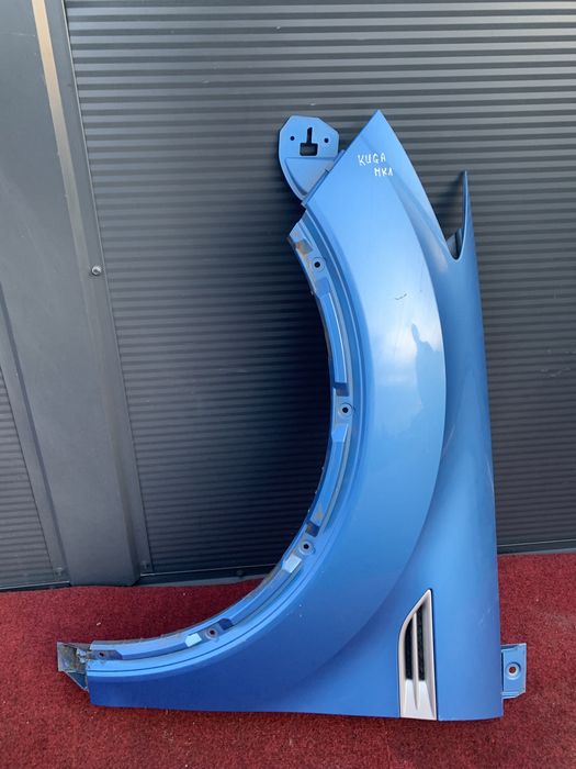 Ford Kuga MK1 błotnik lewy przedni przód niebieski