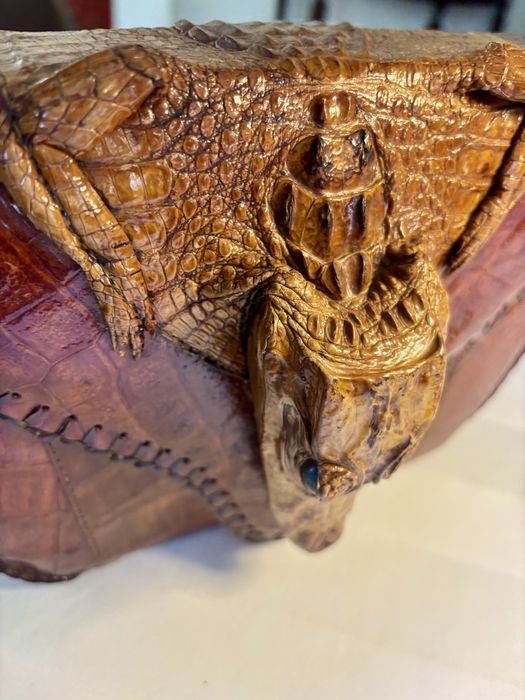 Mala em pele de crocodilo verdadeira