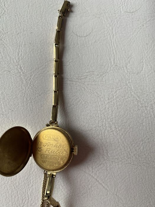 Золотые часы фирмы( пара)