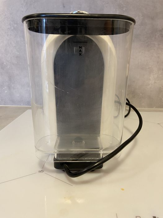 Ekspres do kawy na kapsułki Delta Q Milk Qool Evolution