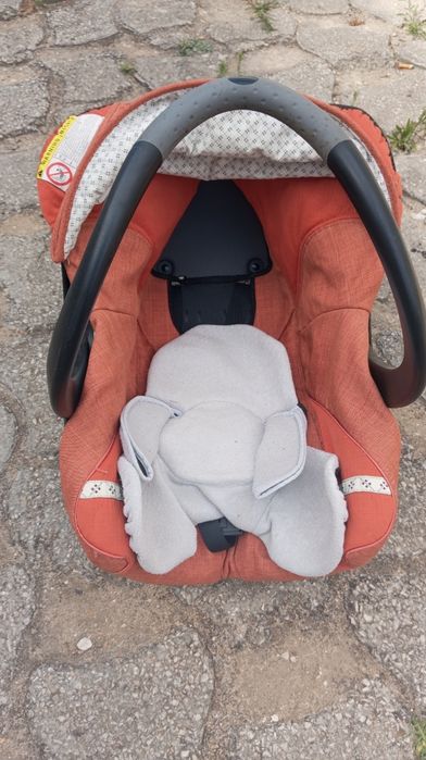 Cadeira ovinho de bebé com sistema de segurança para o carro